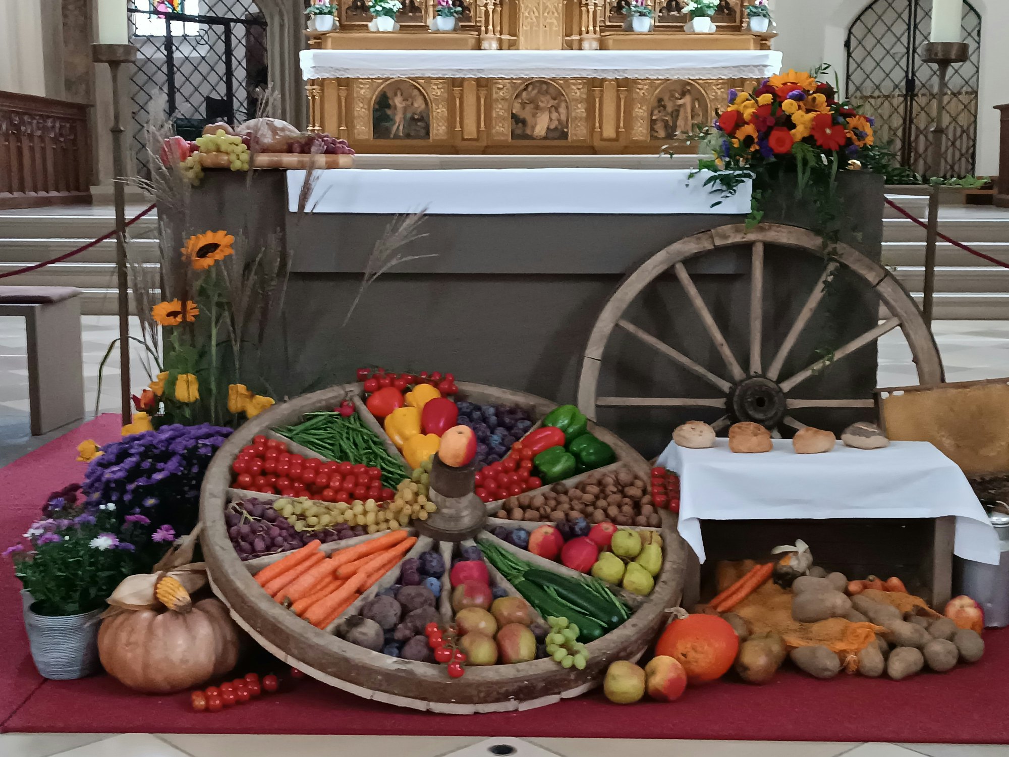 Example of an altar decorated with  Erntegaben.  Photo by  Tomasz Anusiewicz  on  Unsplash  